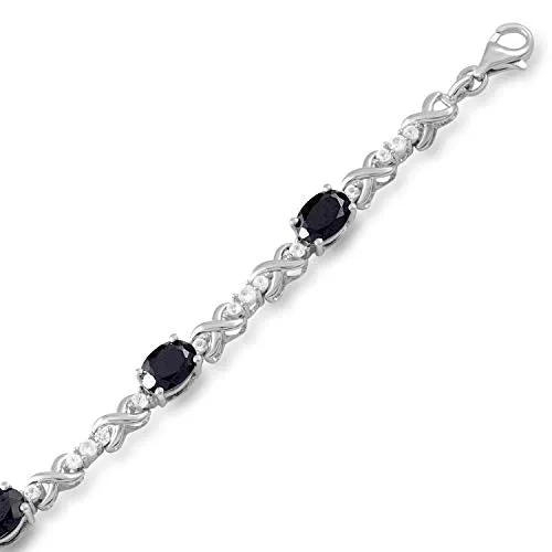 Jewelili Sterling Silver with 7 x 5 mm Oval Shape Onyx and Created White Sapphire Bracelet, 7.25"
